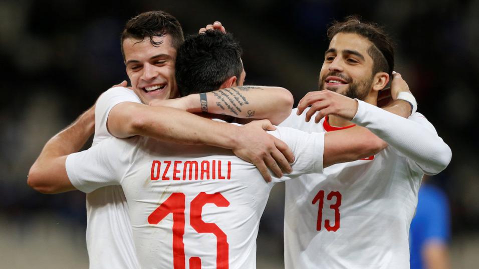Switzerland players celebrate a goal